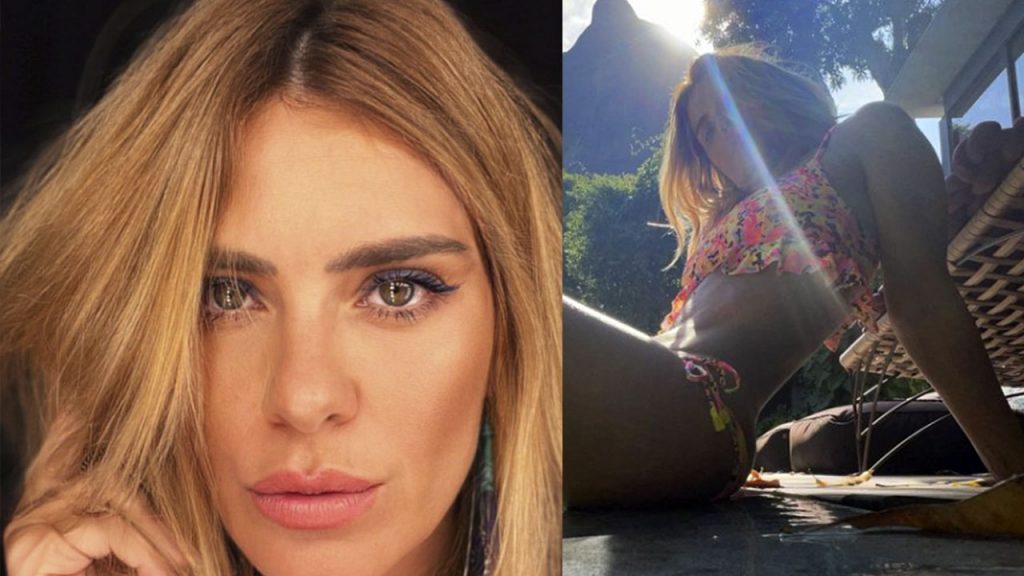 Carolina Dieckmann esbanja beleza e boa forma à beira da piscina